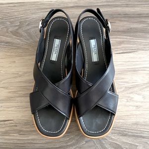 Prada leather cross strap platforms size 7